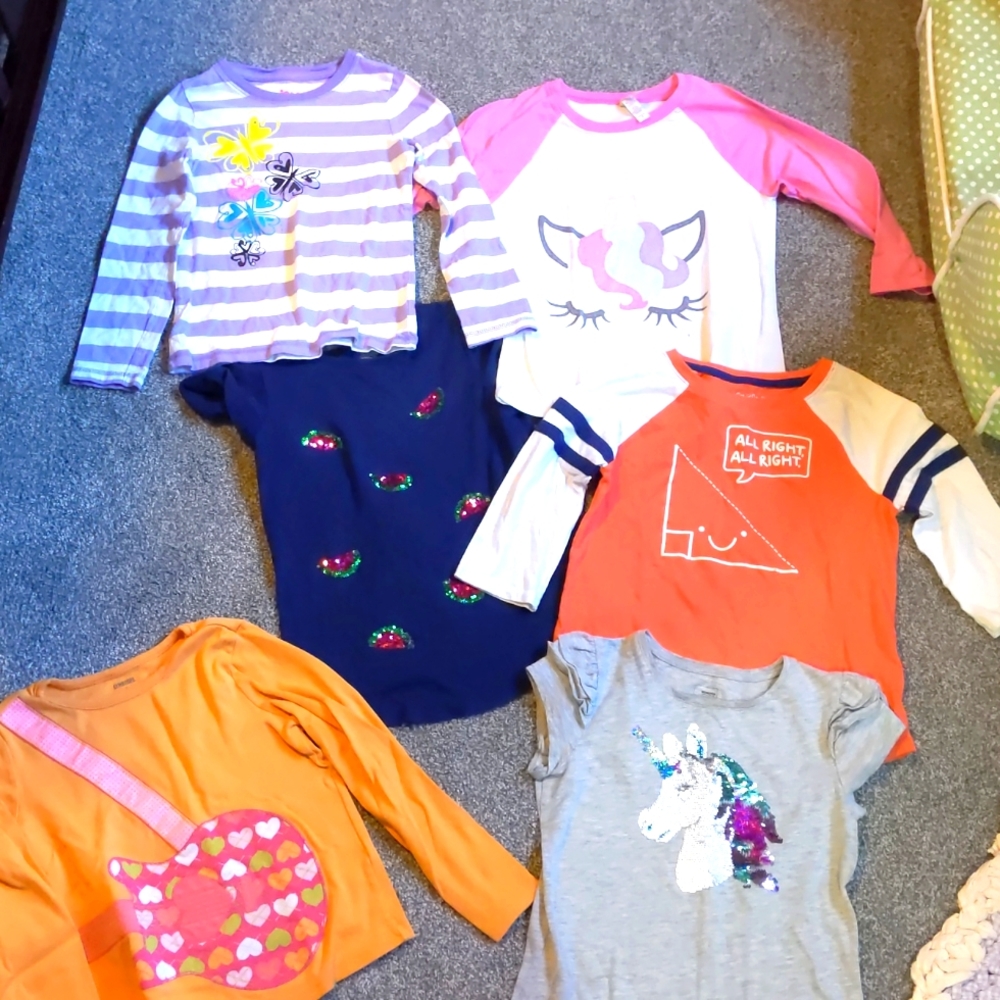 Six sized 7 long and short sleeved tops